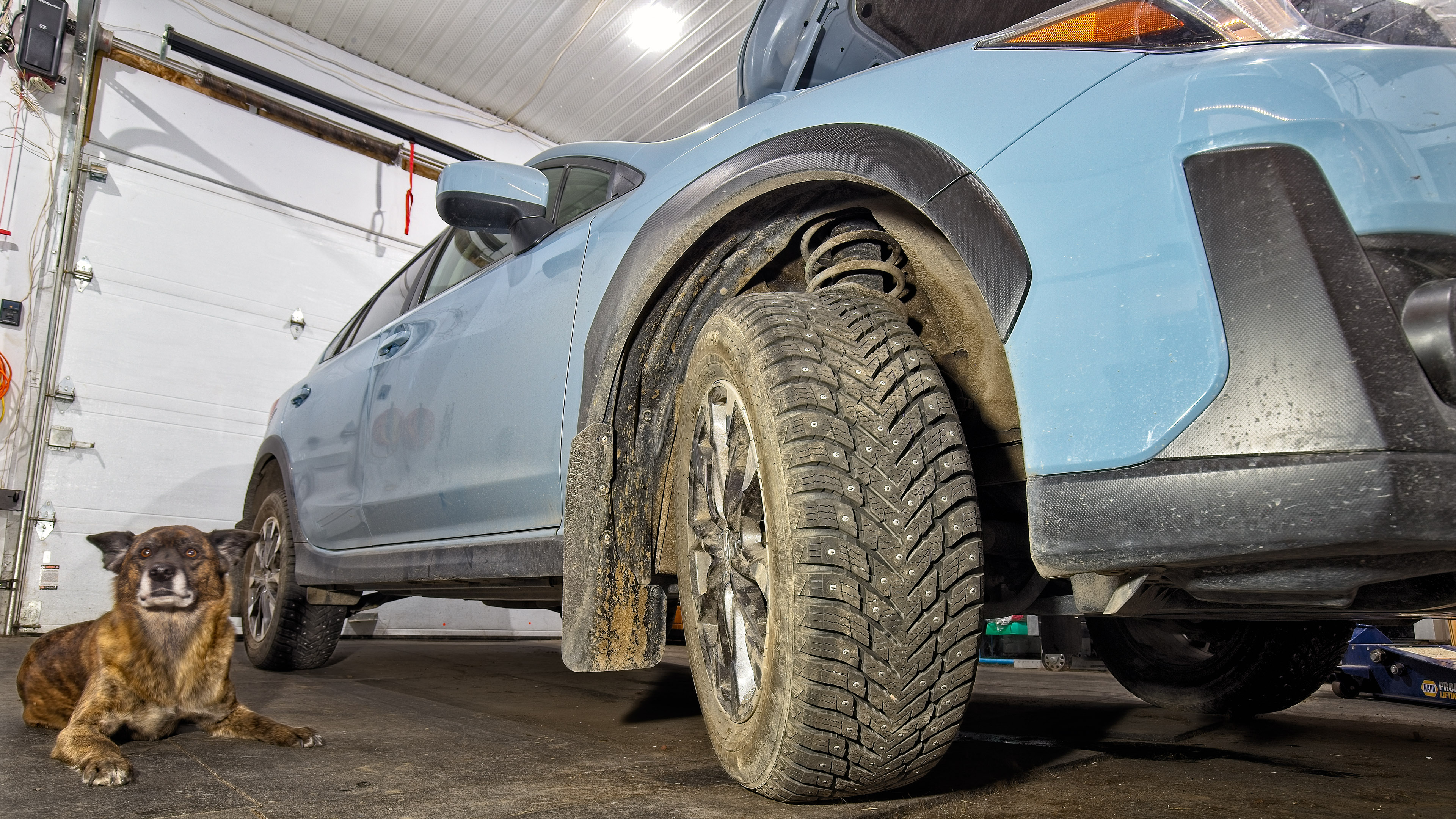 subaru_crosstrek_2023_beryl_winter_tire_flap_oil