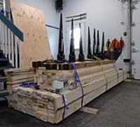 firewood_shed_stacked_tied_pile